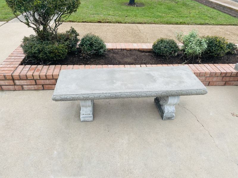 The same concrete bench after cleaning