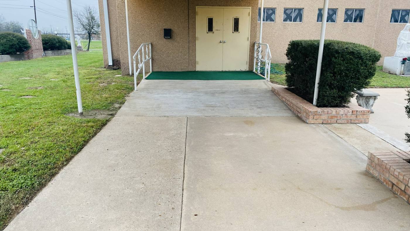 The same church entry after pressure washing