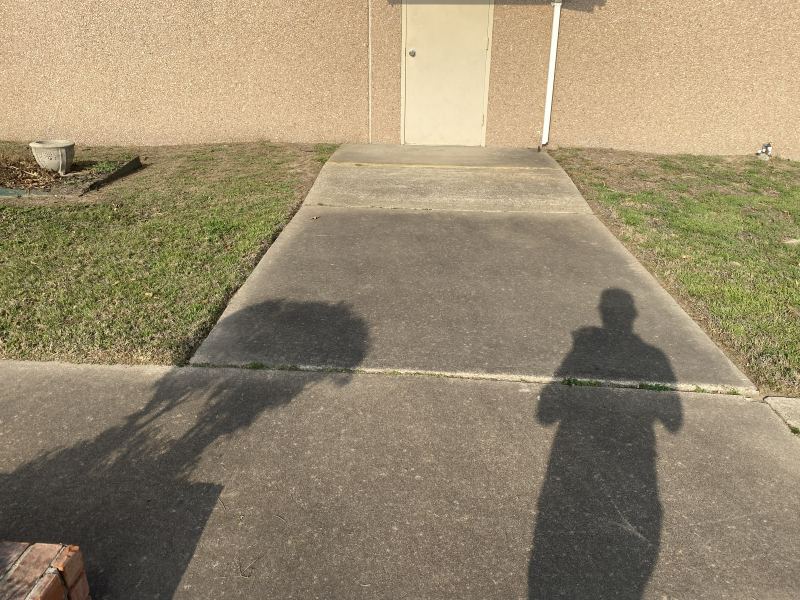 Side-door walkway at St. Ann Catholic Church before cleaning